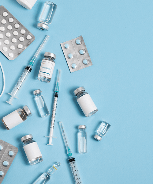 Professional working on pharmaceutical logistics in a modern warehouse environment